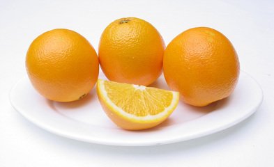 Oranges on plate